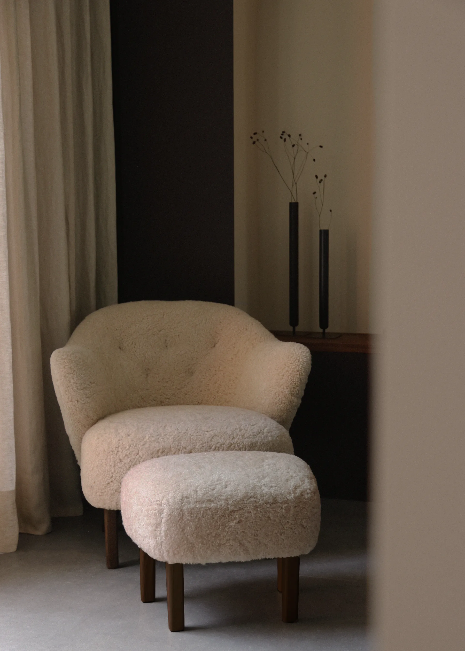 Ingeborg ottoman, Sheep skin moonlight-legs in smoked oak Audo Copenhagen