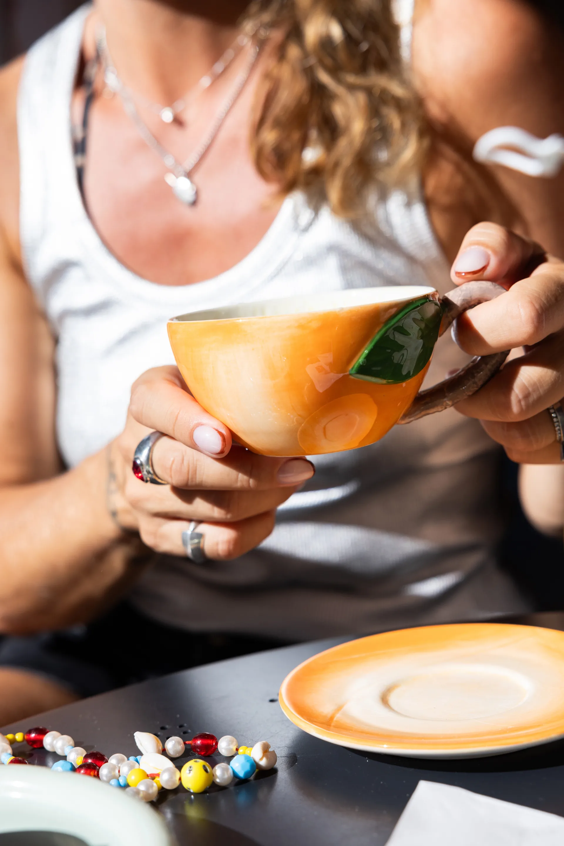 Peach cup with saucer, Orange Byon
