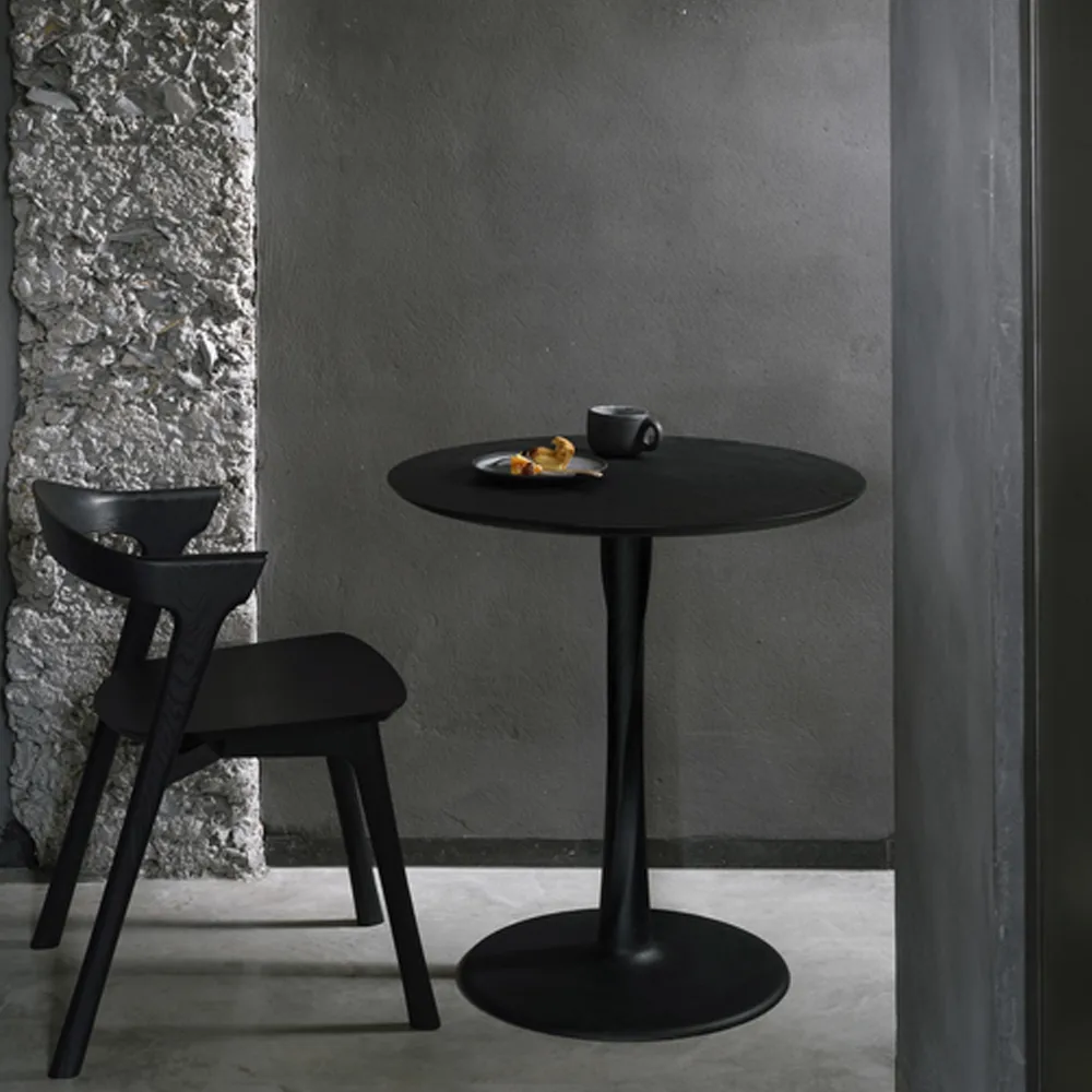 Torsion dining table, Black-stained oak, Ø127 cm Ethnicraft