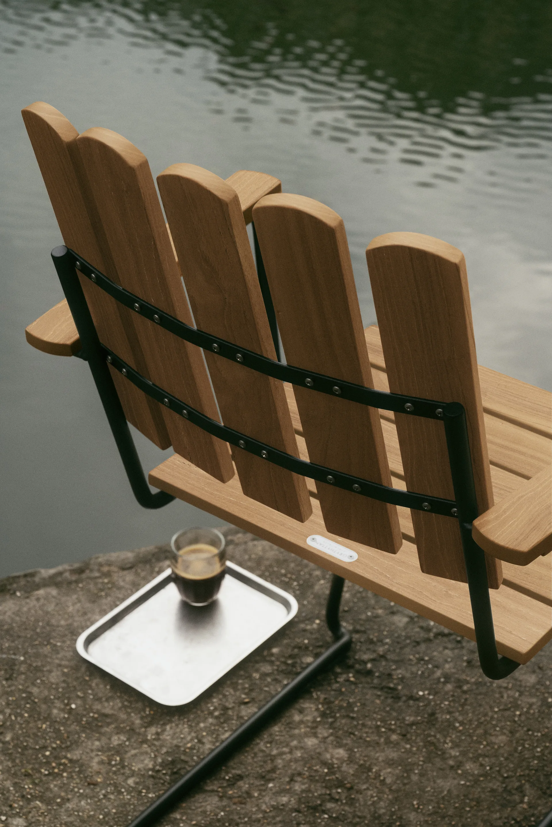 A2 armchair, Untreated teak-black Grythyttan Stålmöbler