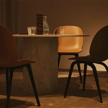 Beetle Plastic chair - Amber brown, black leg - GUBI