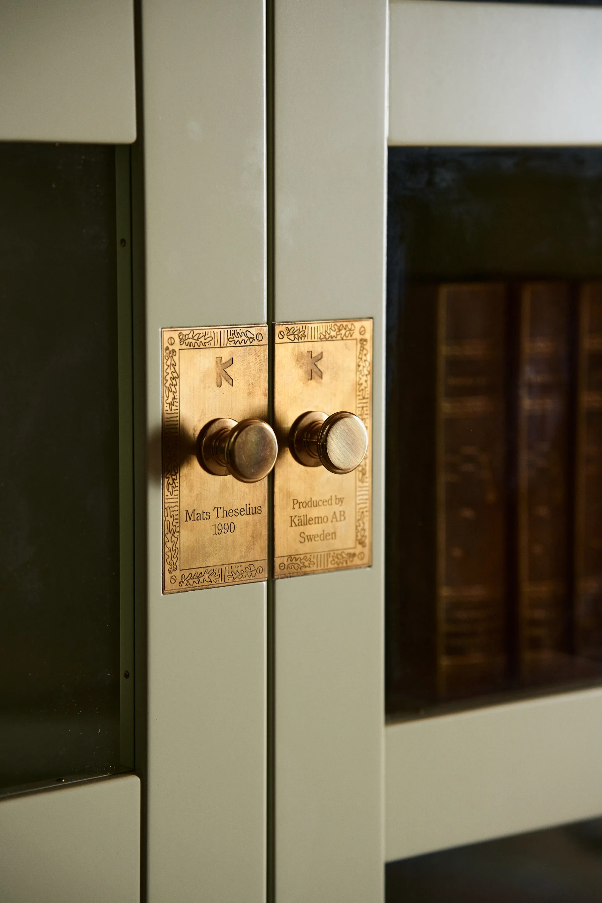 National Geographic bookcase, Light green-oak base-brass Källemo