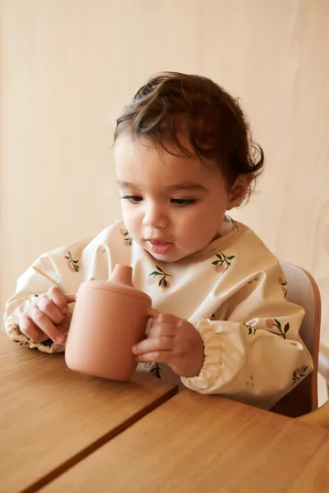 Merle bib with sleeve - Peach-Sea shell mix - Liewood