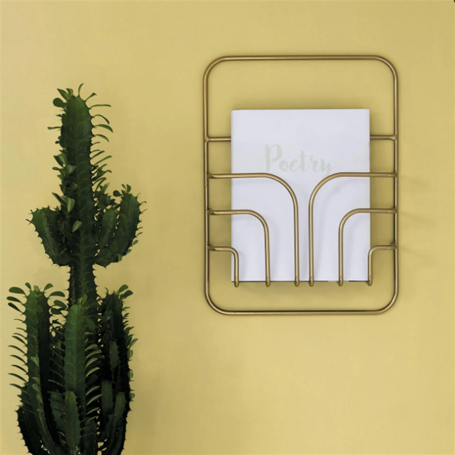 Now S Magazine rack, brass Maze