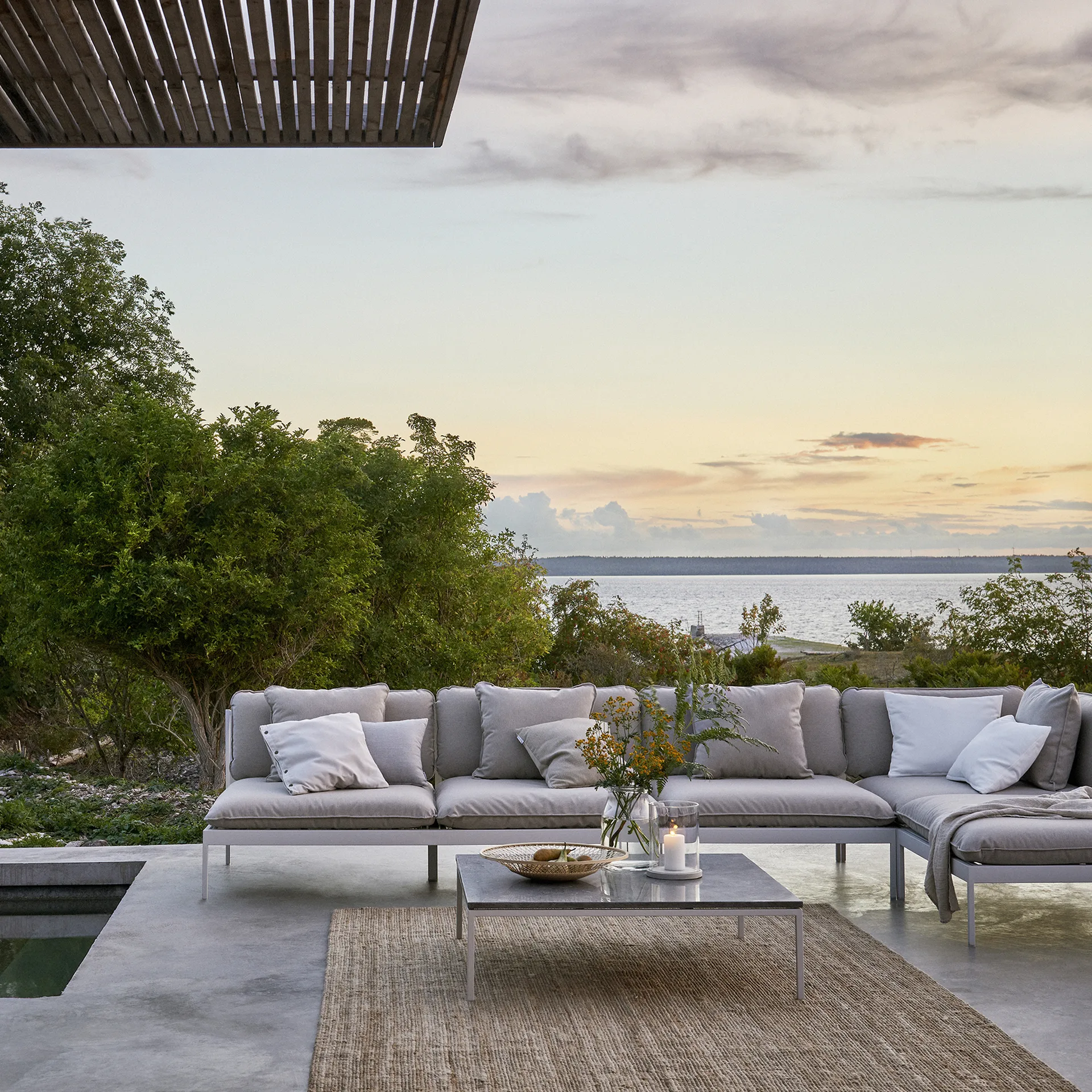 Bönan foot stool, Fiord 551 beige, dark grey aluminium frame Skargaarden
