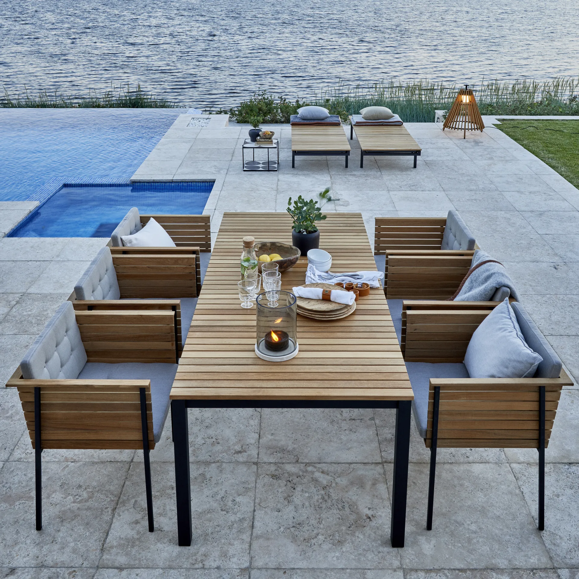 Häringe dining table, Teak, medium, black steel frame Skargaarden