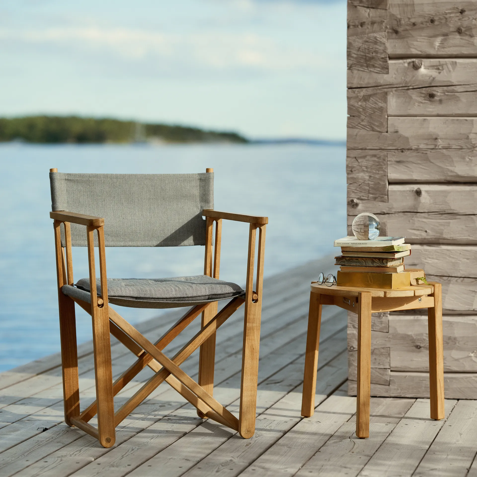 Kryss Lounge armchair, Sunbrella Heritage Papyrus beige, teak Skargaarden
