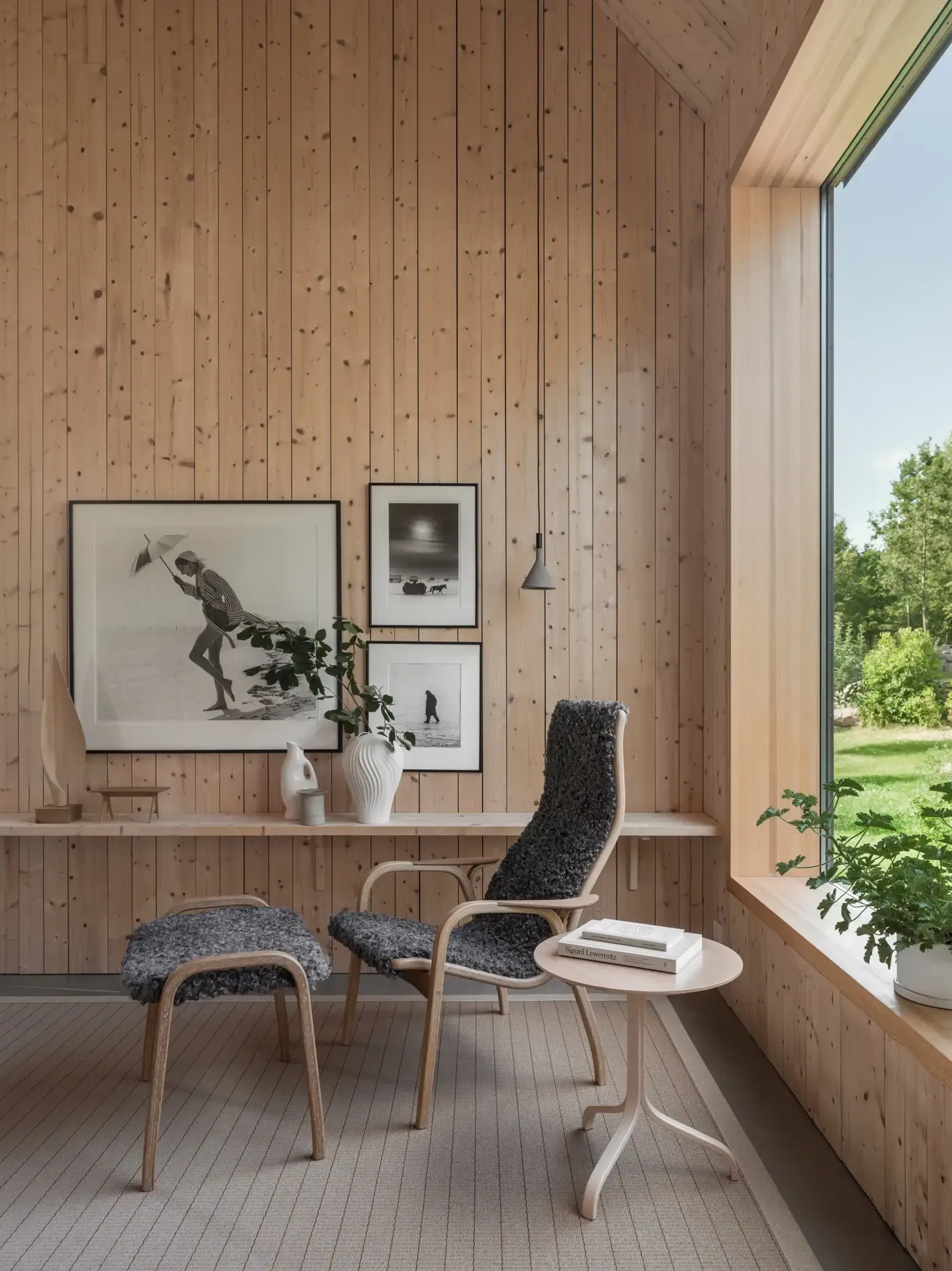 Lamino armchair and footstool, Sheepskin Charcoal-laquered beech Swedese