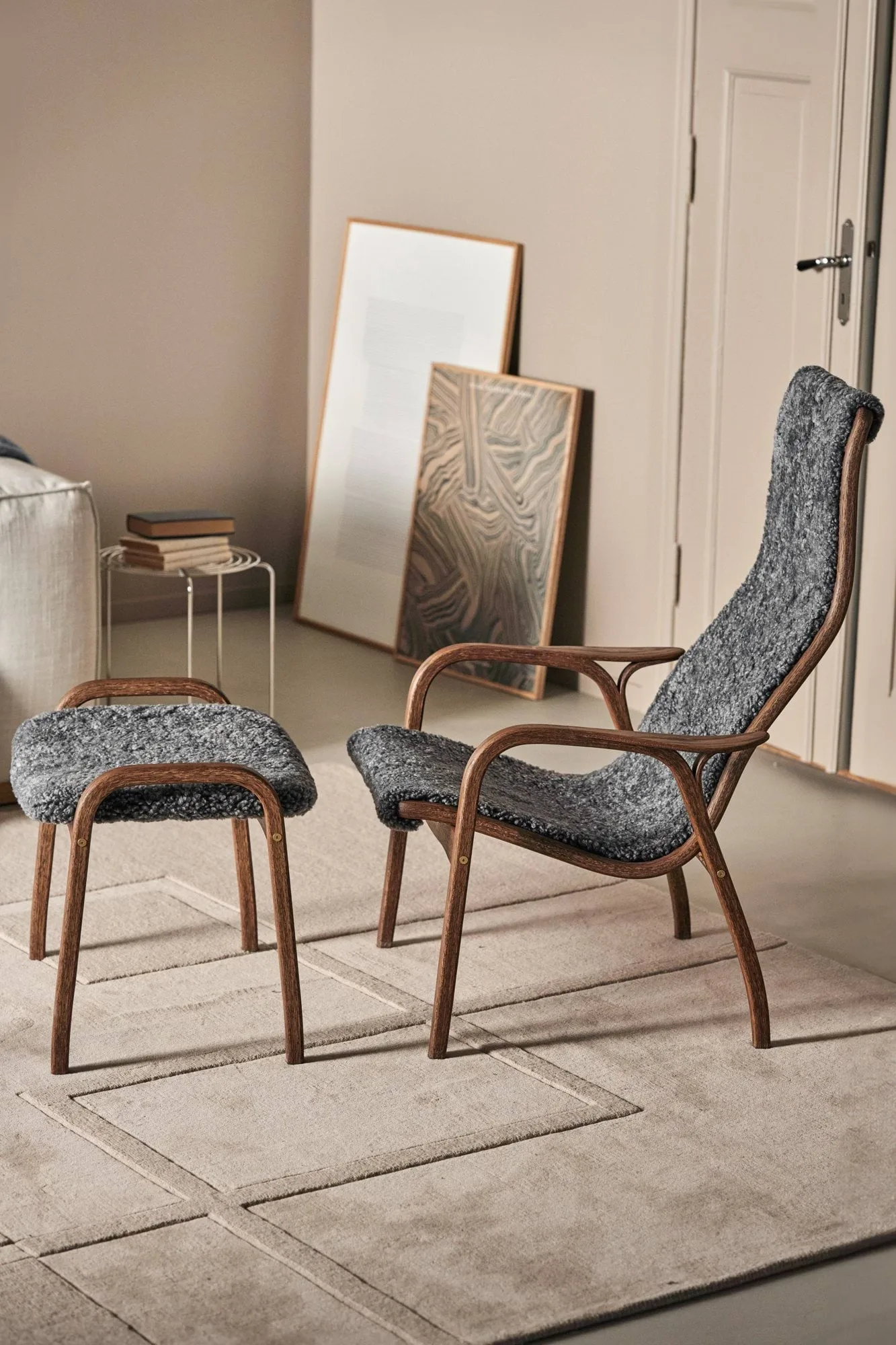Lamino armchair and footstool, Sheepskin Charcoal-Rubio Monocoat Chocolate Swedese