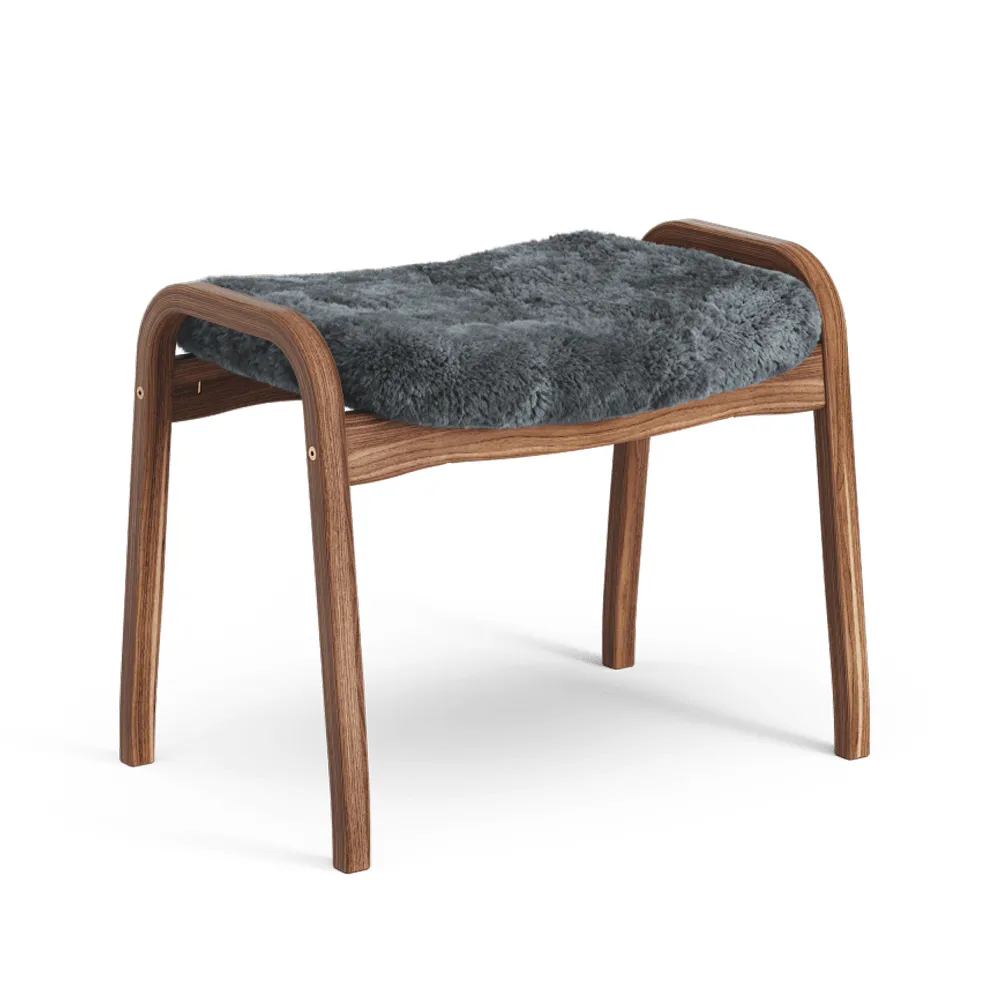 Lamino footstool, Sheepskin charcoal, natural lacquered walnut Swedese