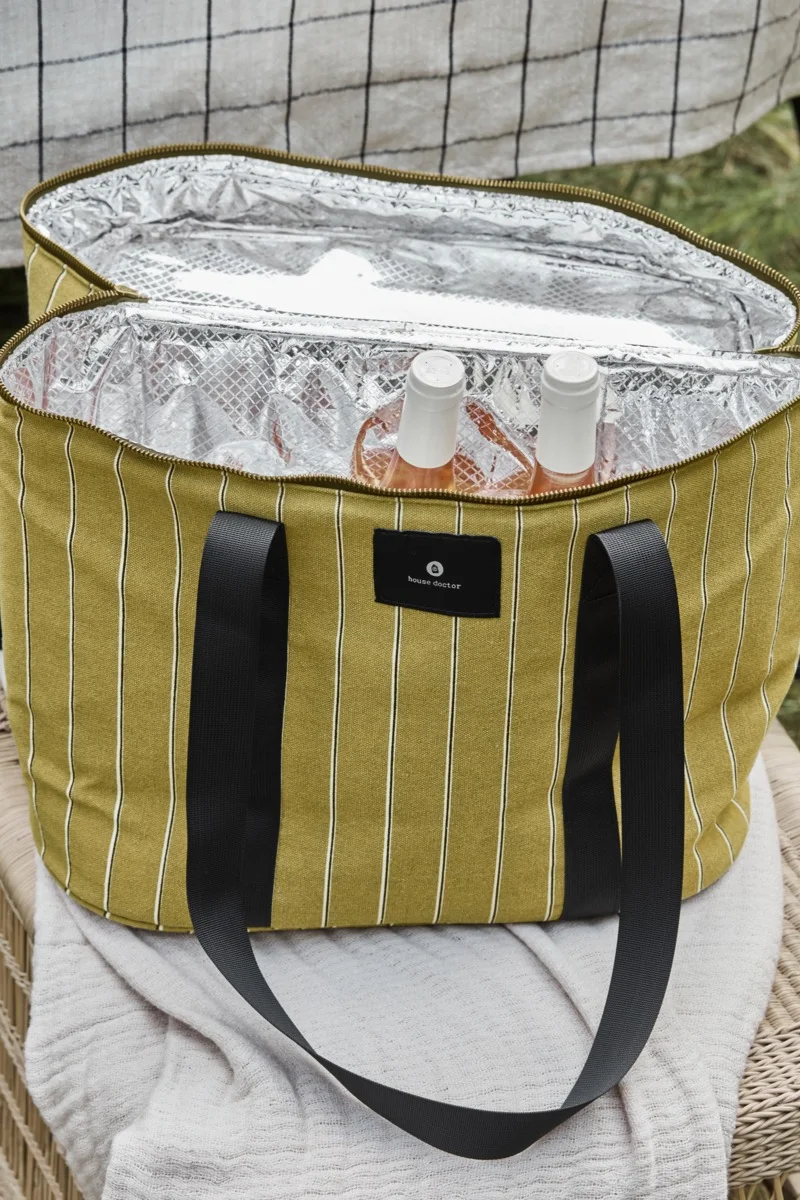 Open olive green striped cooler bag with black handles, two rosé wine bottles inside.
