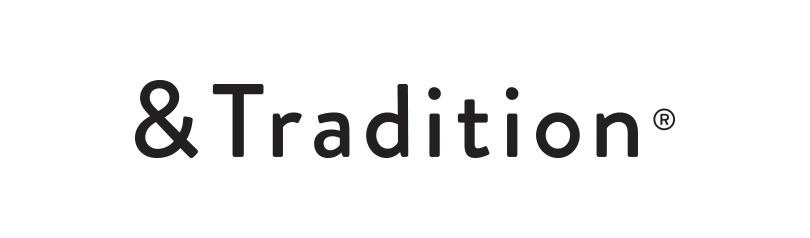Logo with the text '&Tradition®'