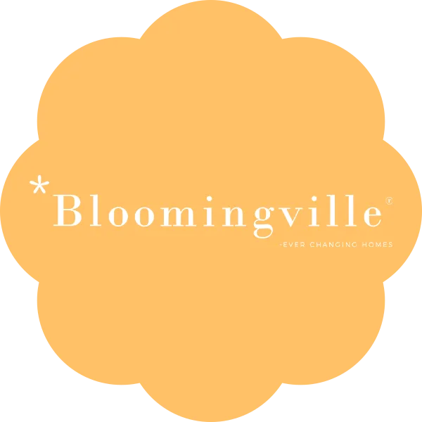 Bloomingville logo in white text on an orange cloud-shaped background, with tagline 'Ever Changing Homes'.