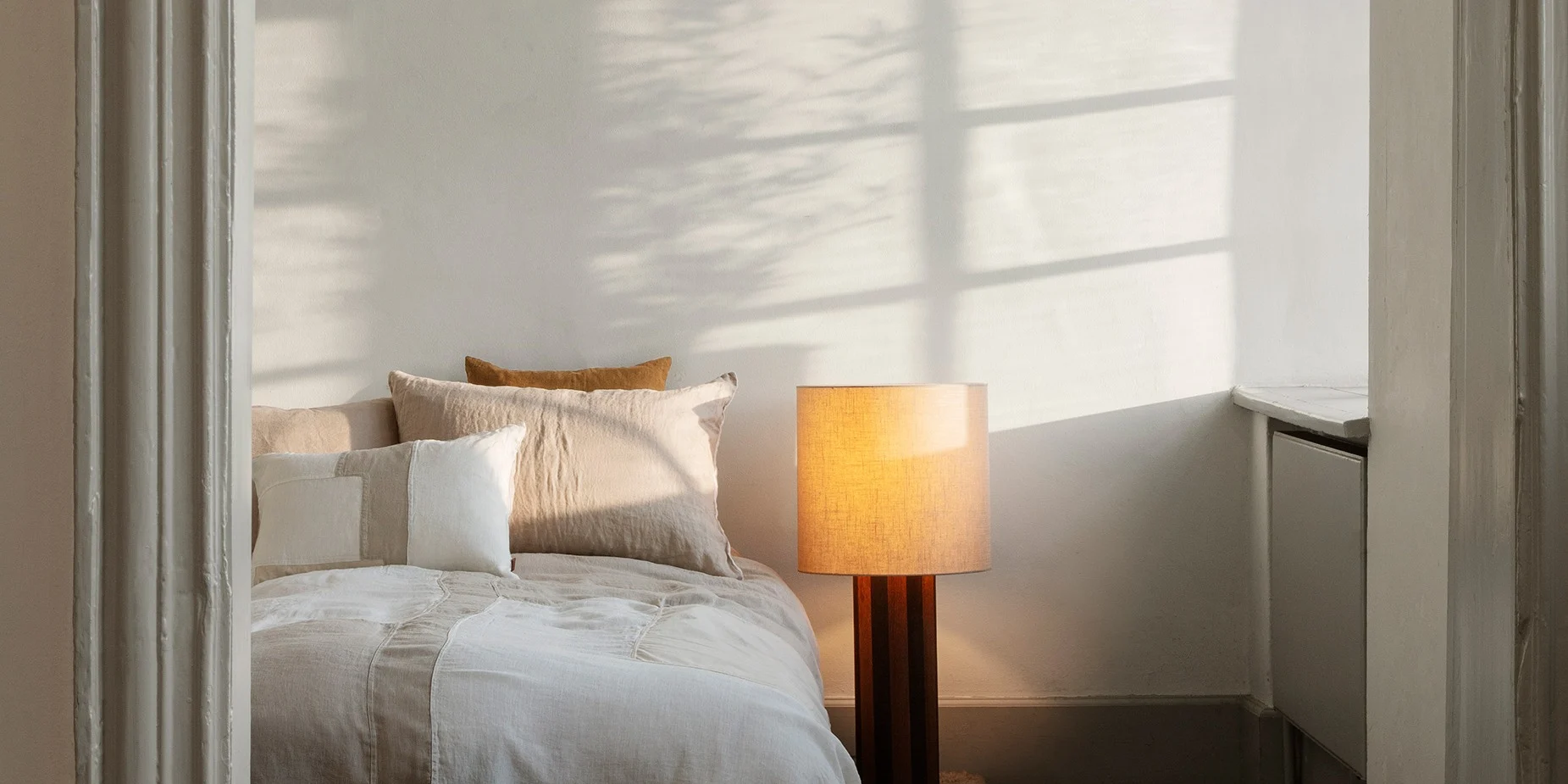 Create a hotel style bedroom - light textiles and good lighting.