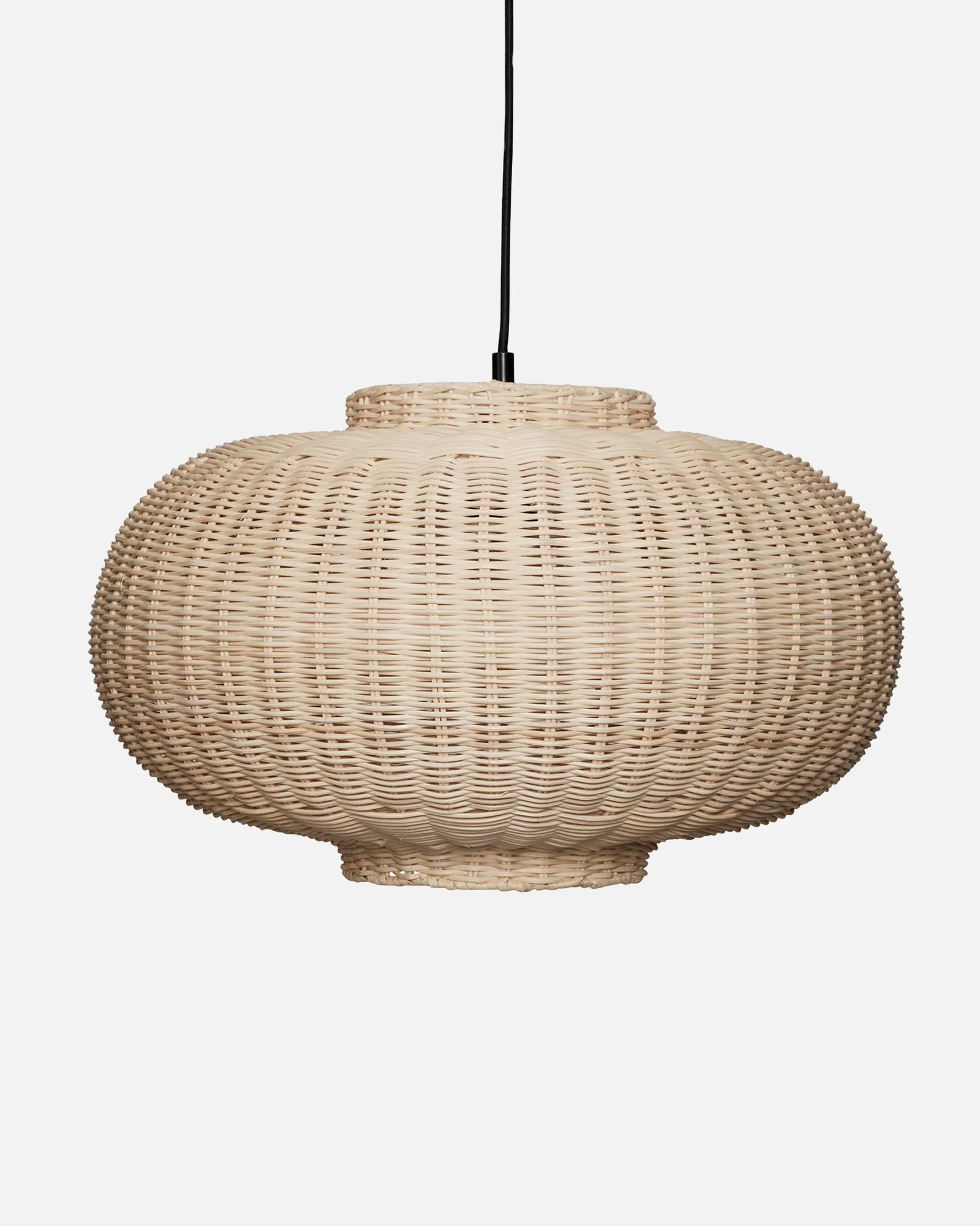 Light-colored woven rattan pendant lamp with a bulbous shape, hanging from a black cord against a white background.