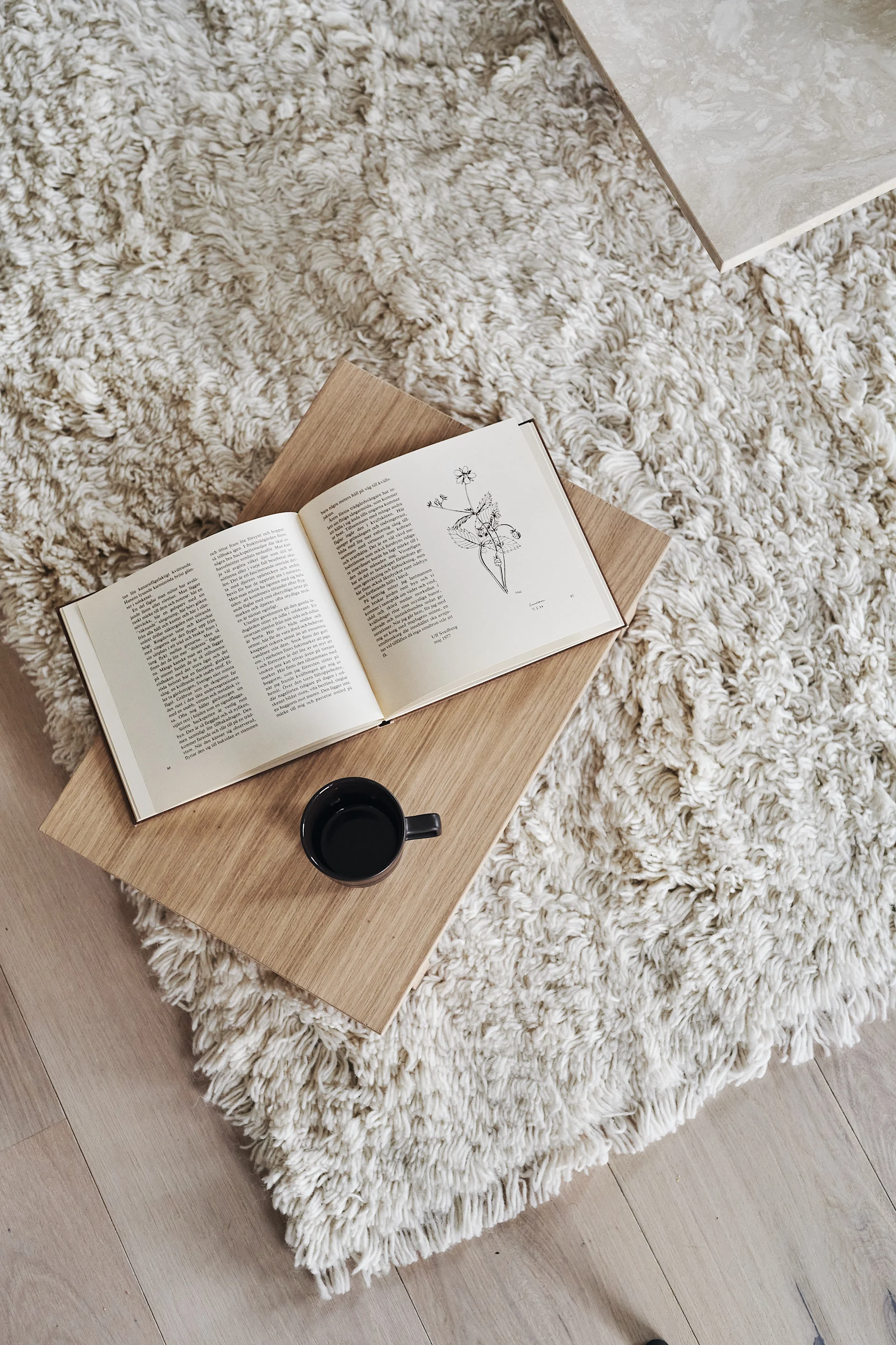Create a hotel style bedroom with the help of a luxurious rug like the deep pile soft wool rug from Scandi Living. 