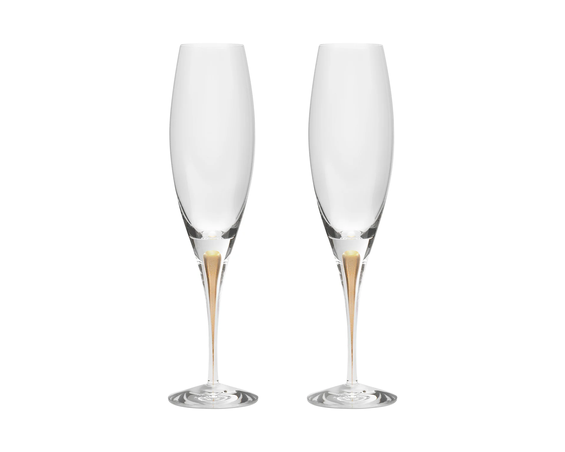 Two clear champagne flutes with gold-colored accents in the stems.