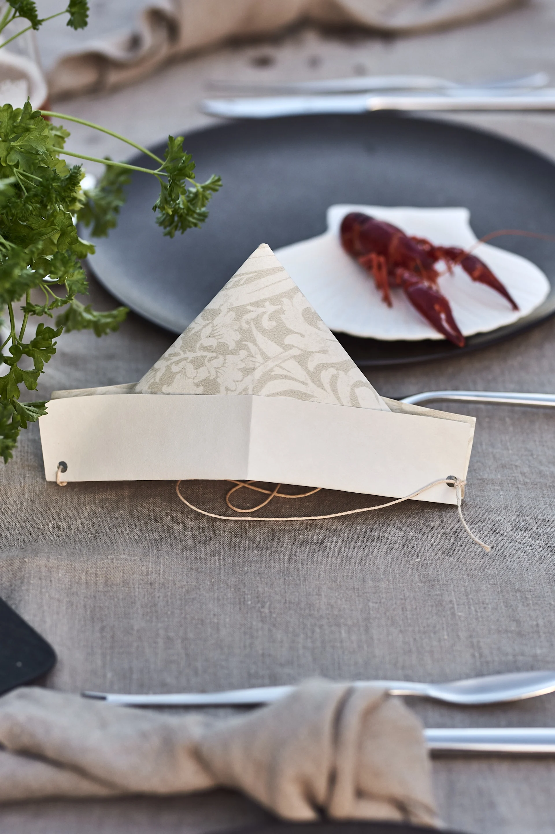 Host a Swedish crayfish party and make paper party hats for your guests.