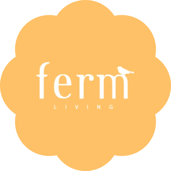 Ferm Living logo with white text 'ferm' and a bird on the 'm', 'living' below, on an orange cloud-shaped background.