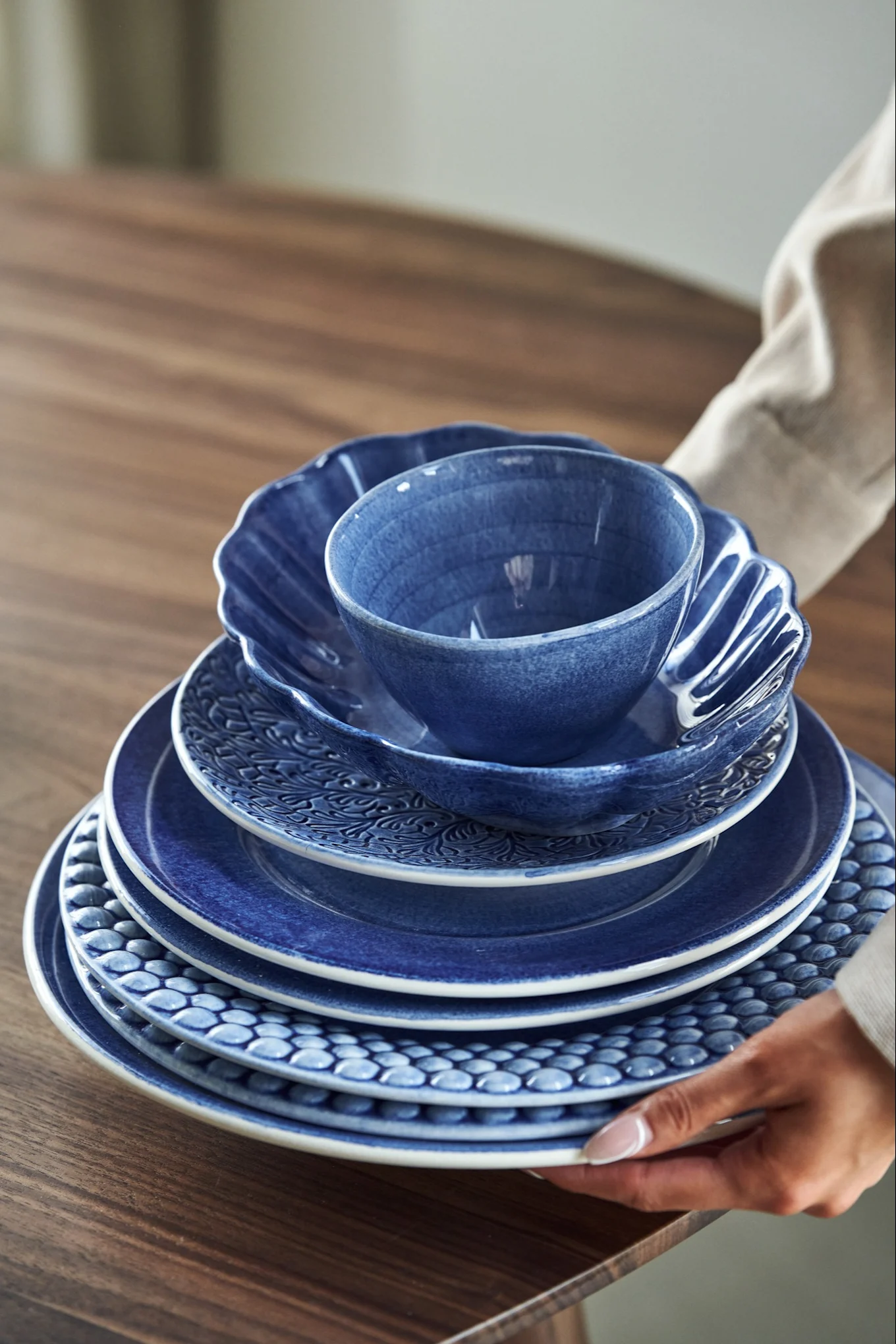 Set down a collection of plates and bowls from the Mateus MSY, Oyster, Lace, Basic and Bubbles series.