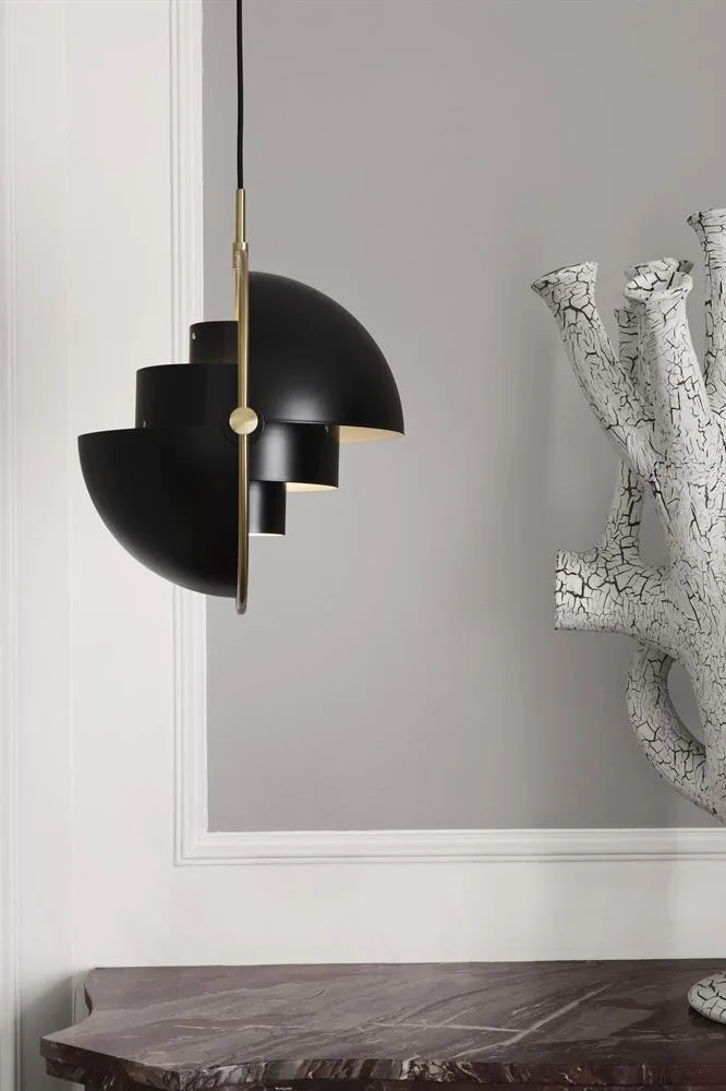 Discover GUBI's top tips for lighting your home. The iconic Multi-Lite is a timeless classic. Direct the light however you want with the moveable shade.